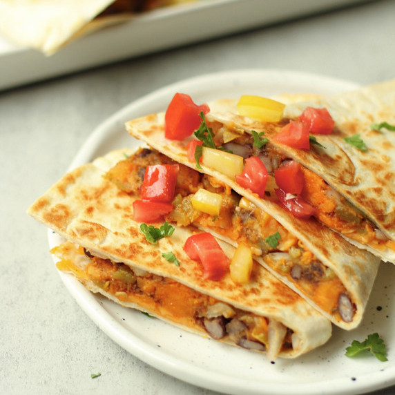 sweet potato black bean quesadillas on a serving platter