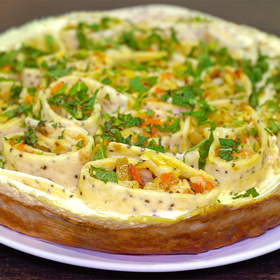 Cabbage pie on a plate.