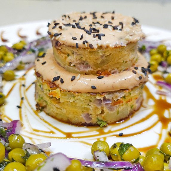 Potato pie with salad on a plate