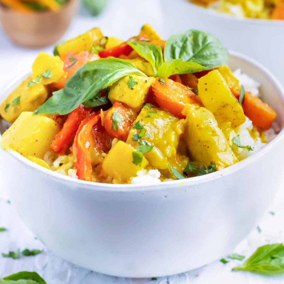 Thai Yellow Chicken Curry with Potatoes RECIPE served in a white bowl.