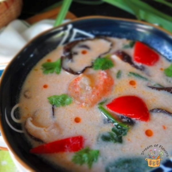 Thai coconut soup with veggies and shrimp in coconut milk.
