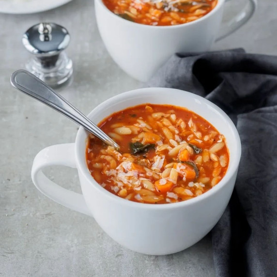 Mug of Tomato and orzo soup