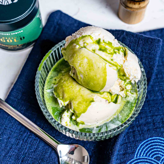 Matcha poured over vanilla bean ice cream - matcha affogato