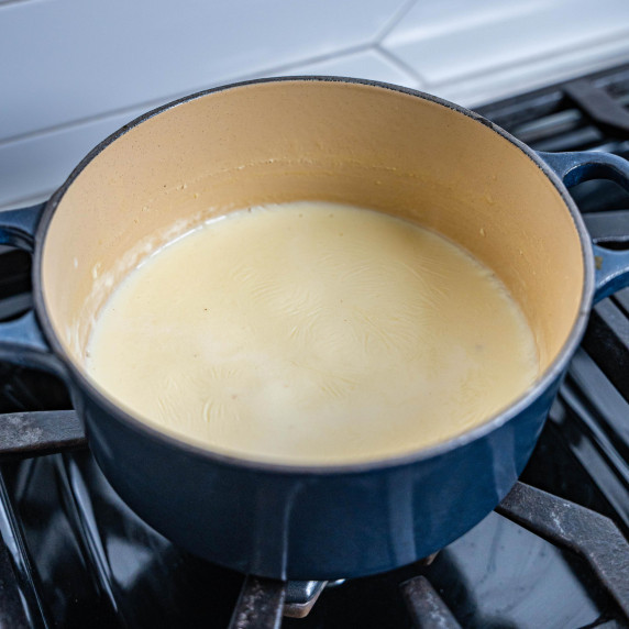 medium saucepan with homemade bechamel sauce