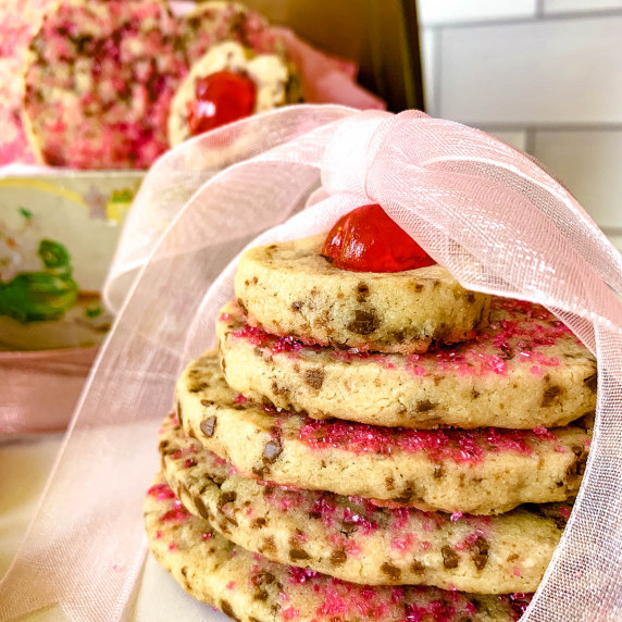 stack of cookies with a pink bow