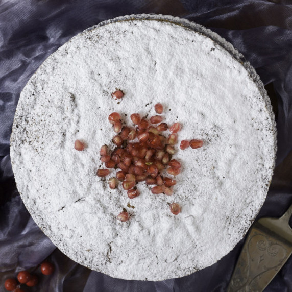 vasilopita, greek, new year's cake, pomegranate seeds, powdered sugar