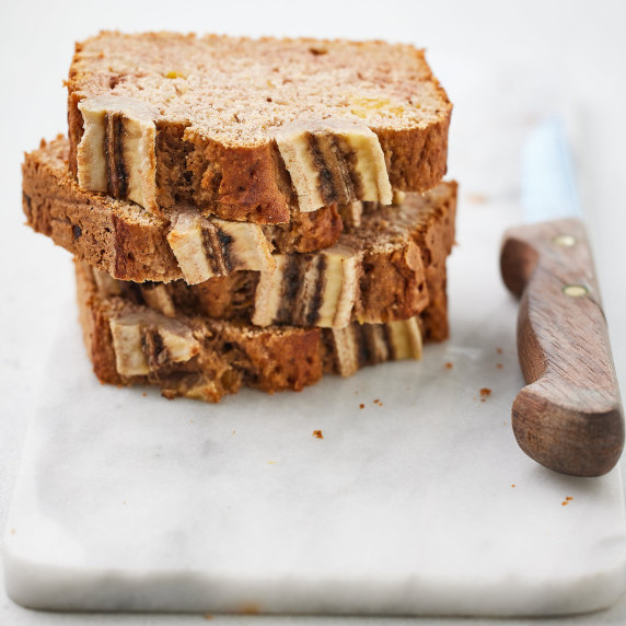 Slices of vegan banana bread stacked together