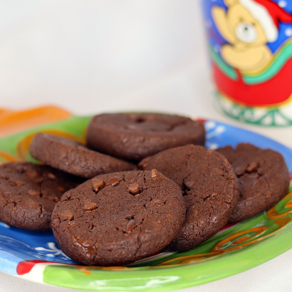 World peace cookies arranged on a holiday plate against a white background.