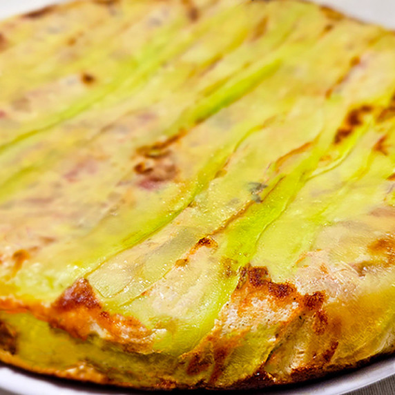 Zucchini and Cabbage pie on a plate