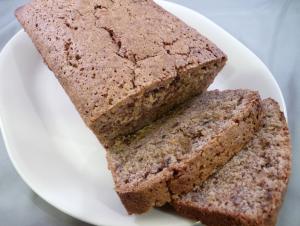 Zucchini bread sliced on a white platter