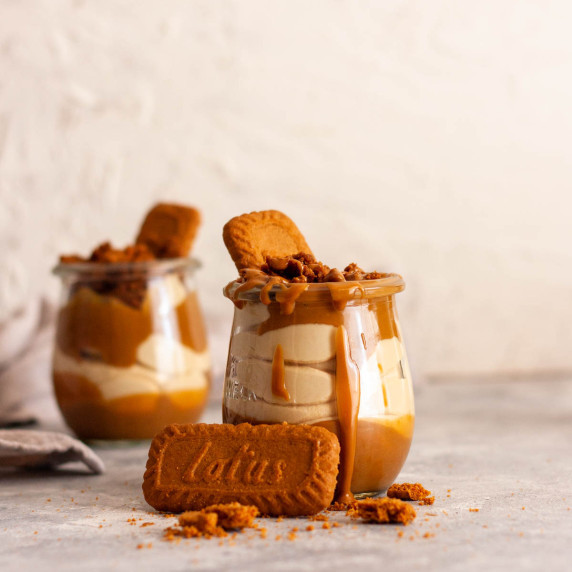 Lotus Biscoff Cheesecake Cups and cookies in tulip jars.