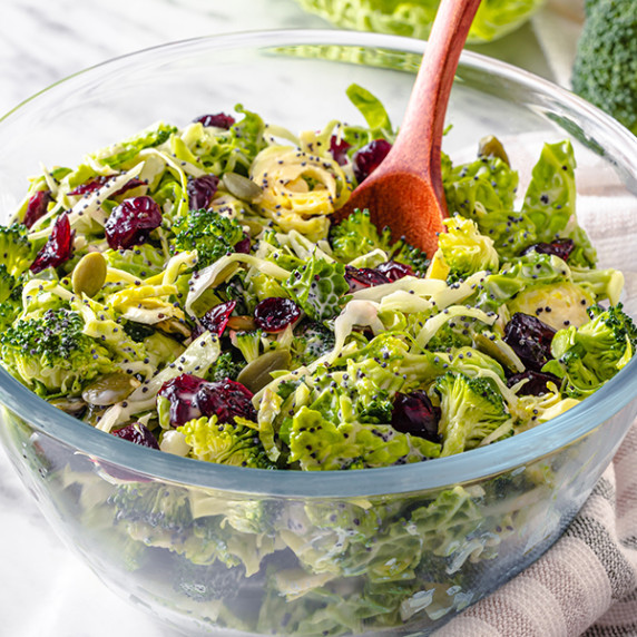 Broccoli Salad with Cranberries and Poppy Seed Dressing in a large mixing bowl