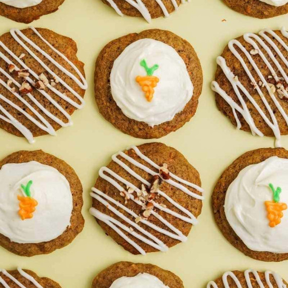 Close view of soft carrot cake cookies frosted two ways.
