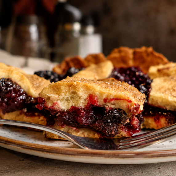 Cherry slab pie with flaky crust and juicy cherry filling.