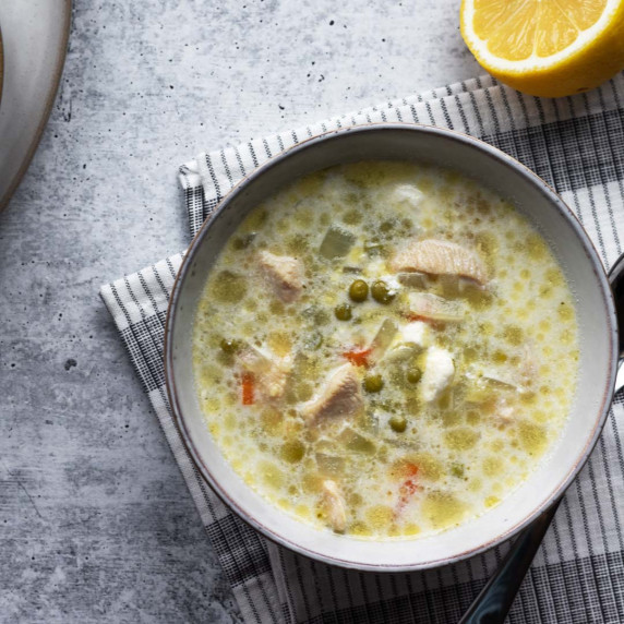 Chicken orzo soup in a bowl overhead shot