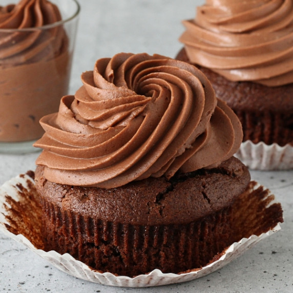 Chocolate cupcake topped with a rich swirl of chocolate cream cheese frosting