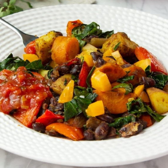 A quick and easy vegetarian dinner made with black beans and vegetables. Comfort food cooked in a si