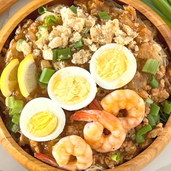 filipino palabok in a wood bowl