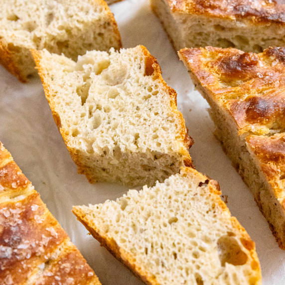 Freshly baked oregano and salt focaccia with golden crust