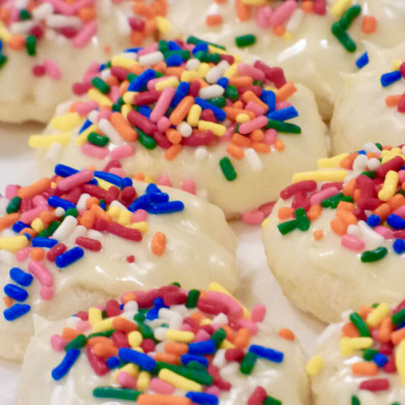 meltaway cookies with colored sprinkles on a white plate.