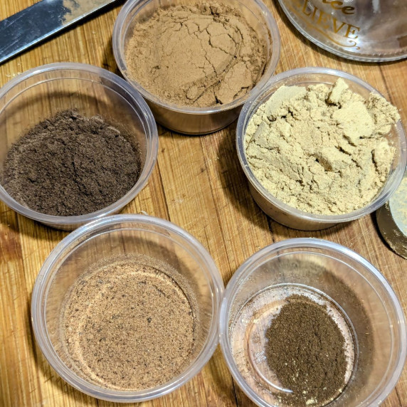 Small containers of the spices needed to make Gingerbread spice blend.