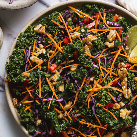 Anti Inflammatory Salad with turmeric dressing arranged in an aesthetic bowl