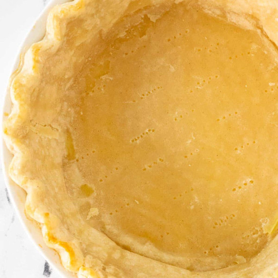gluten free pie crust on a white surface