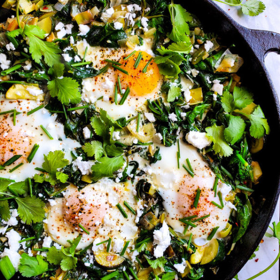 Sauté of green vegetables with eggs, fresh herbs, and crumbled feta.