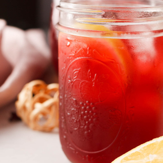 closeup of hibiscus lemonade in mason jar