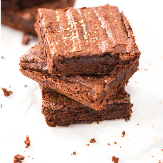 stack of hershey's cocoa brownies on a white background.