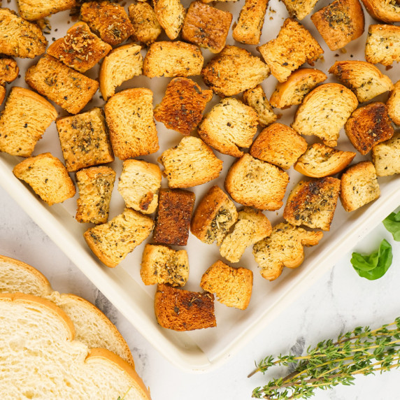 Baked croutons on baking sheet.
