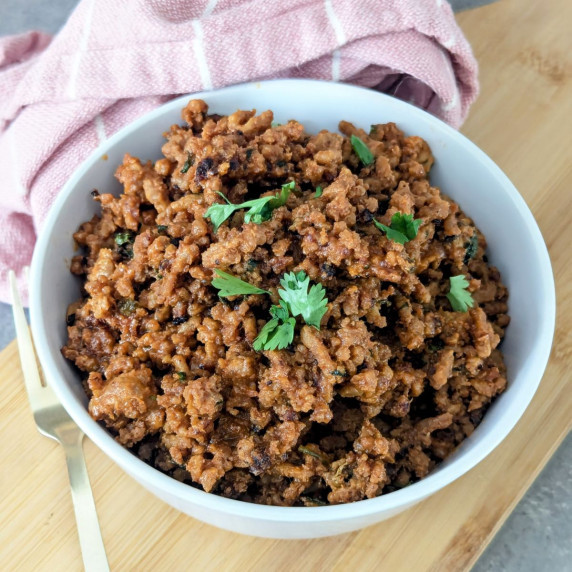 A bowl of Korean ground pork topped with cilantro.