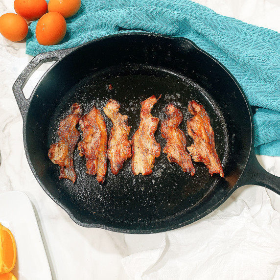 kosher bacon in a cast iron skillet