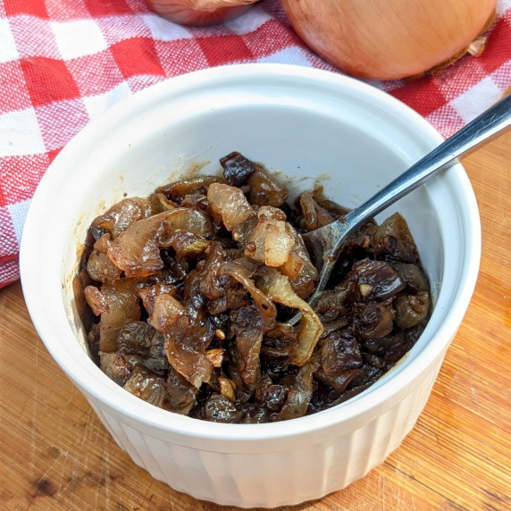 A ramekin filled with onion marmalade.