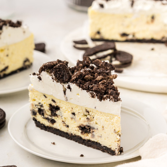 slice of oreo cheesecake on small white dish