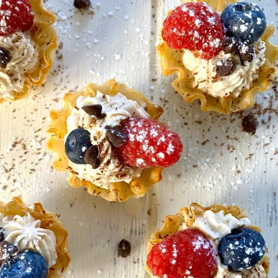 phyllo cups with Philadelphia cream cheesecake filling with berries.