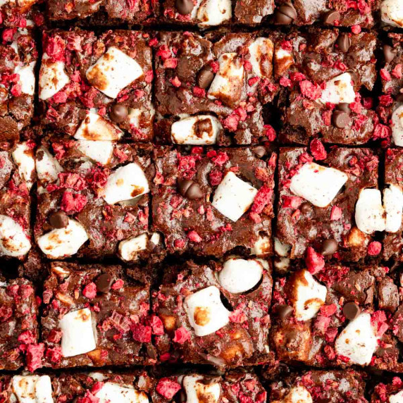 Sliced rocky road brownies in baking pan.