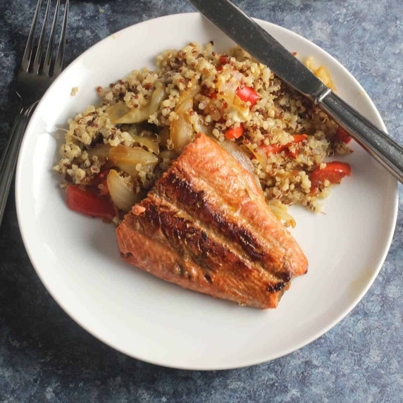 pan seared salmon plated with quinoa