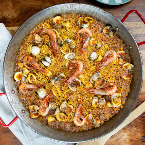 seafood paella viewed from top with shrimps