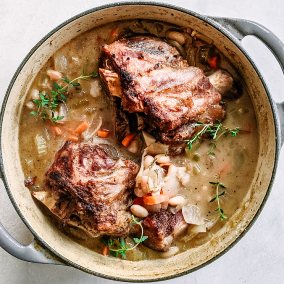 Braised pork shanks with white beans in a le creuset