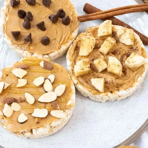 Rice cakes with peanut butter and toppings
