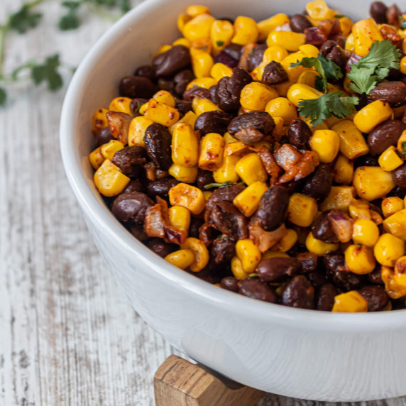 beans and corn in a white bowl