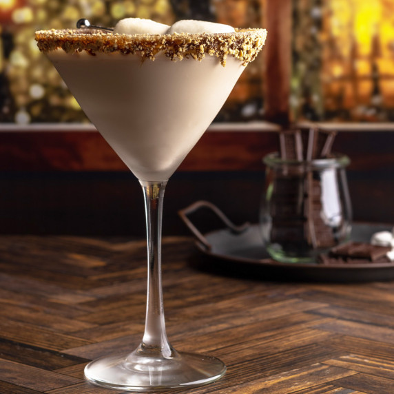 S'mores martini in a glass with graham crackers rim