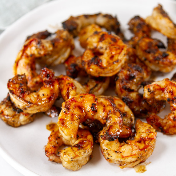 cooked shrimp on a white plate.