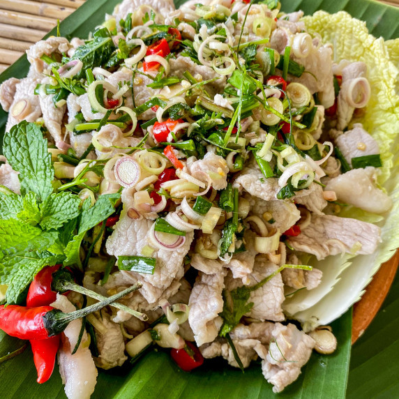 Thai lemongrass salad with pork, chilies, and fresh herbs.