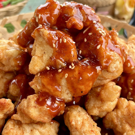 Thai volcano chicken, crispy fried chicken smothered in a spicy red sauce.