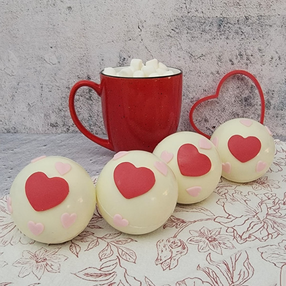 hot cocoa bombs decorated for Valentine' Day 
