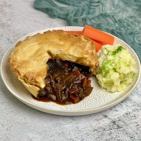 Vegan mushroom and guinness pie served with mash and carrots.